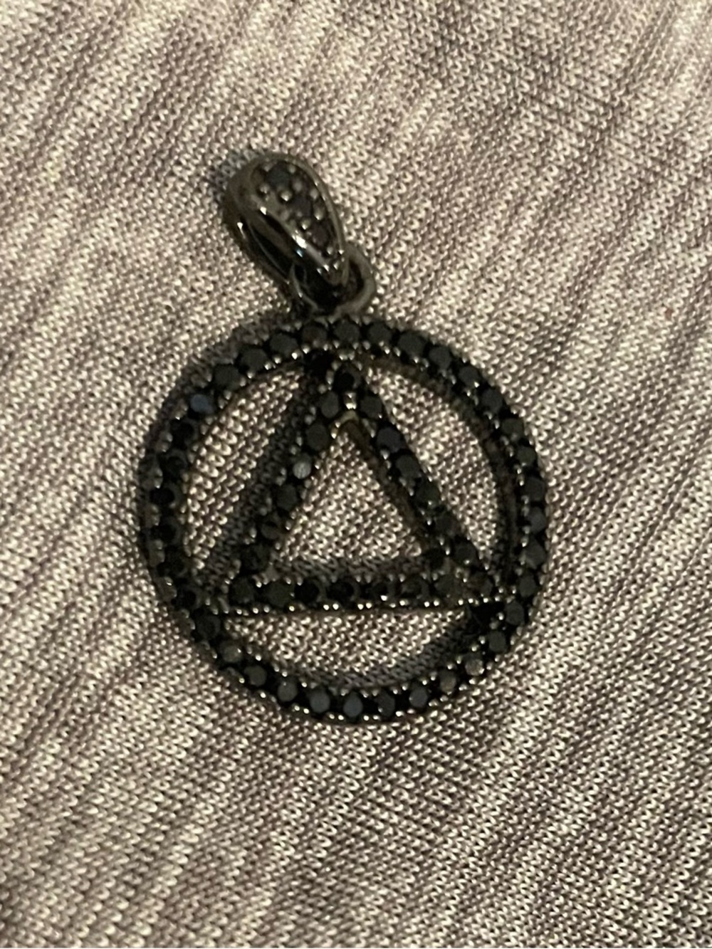 Black sparkle AA symbol pendant.